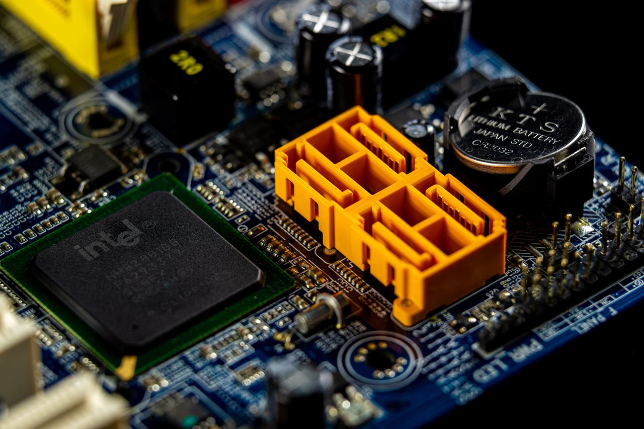 Mastering the First Impression: Your intriguing post title goes here Detailed view of a computer motherboard showcasing an Intel microprocessor and electronic components.